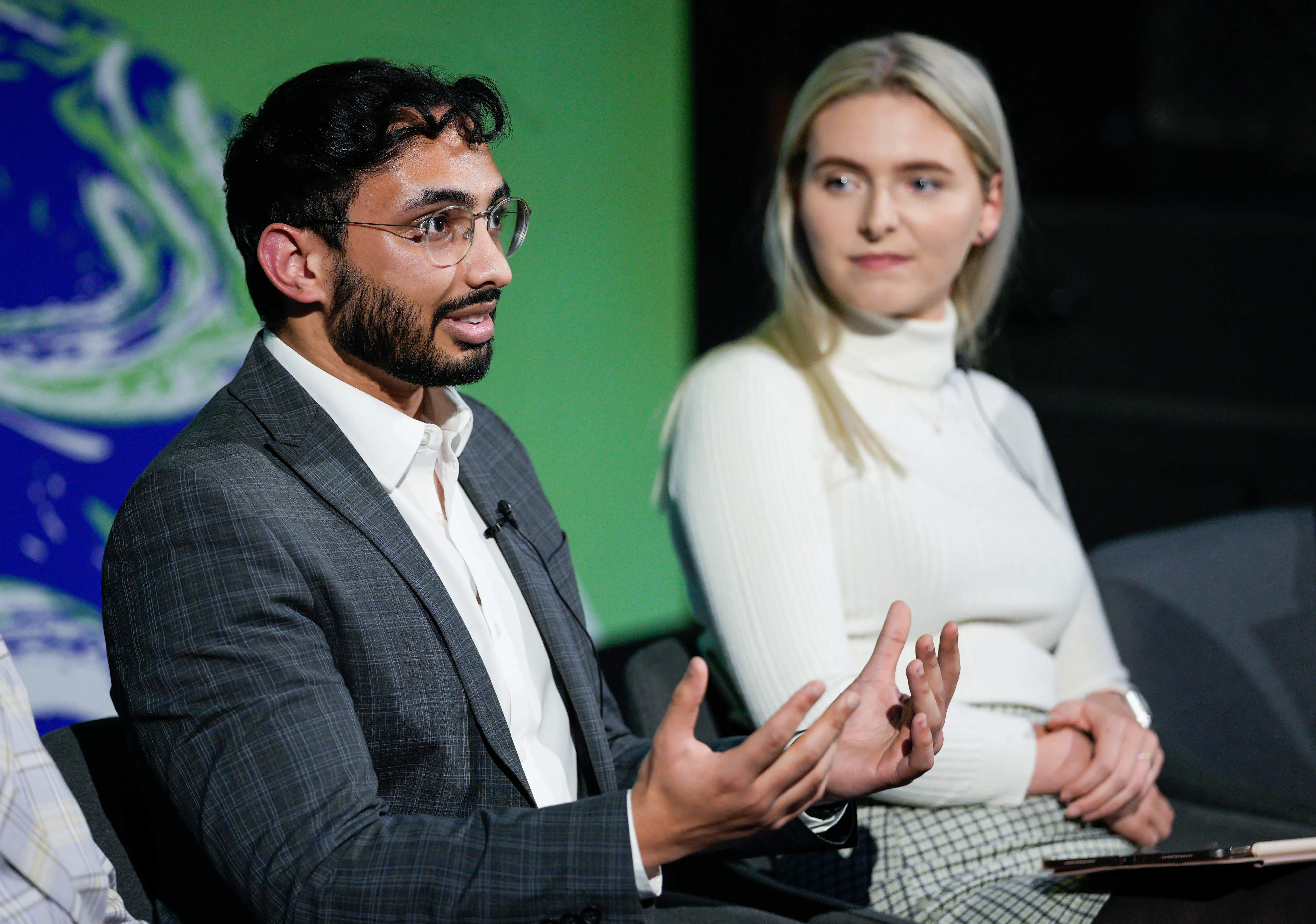 Iman speaking on the panel